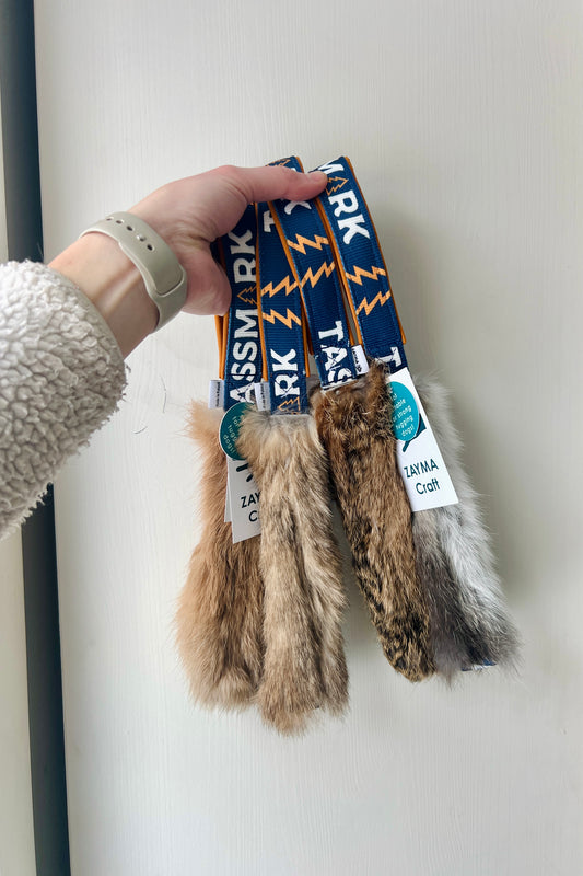 Fickleksak i kaninpäls med handtag